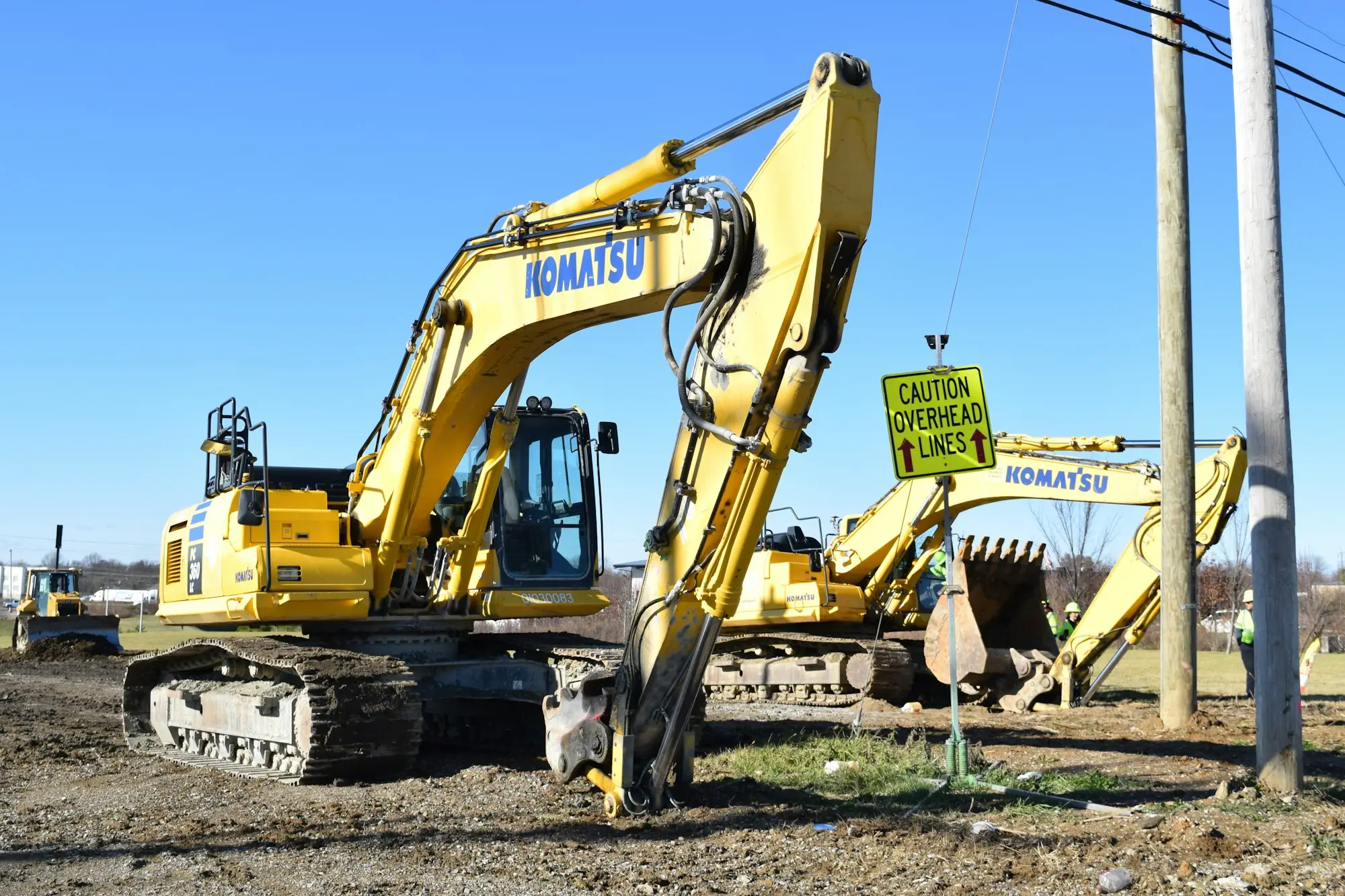 Yellow bulldozer working on a dirt site