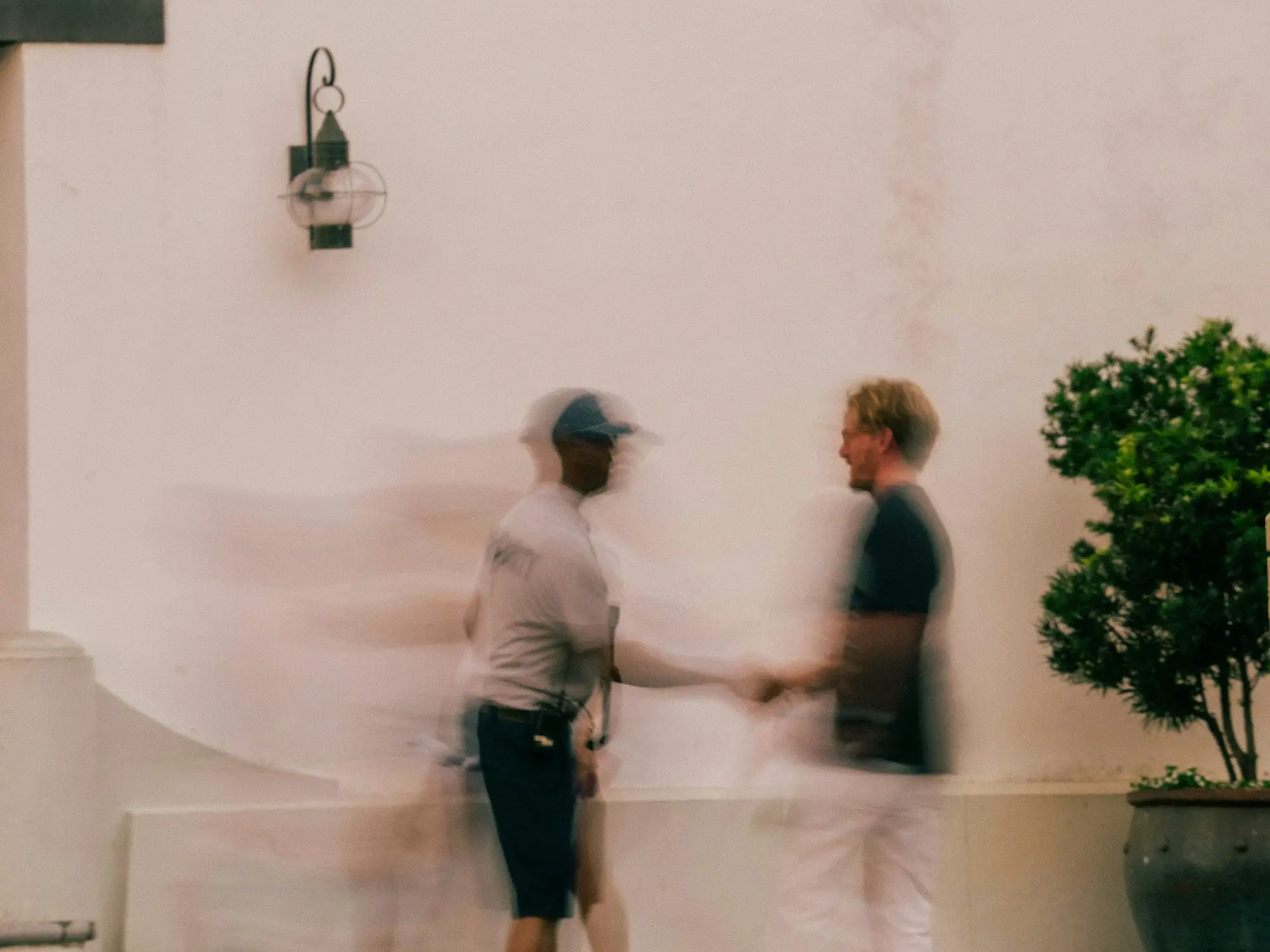 Two people shaking hands on a deal